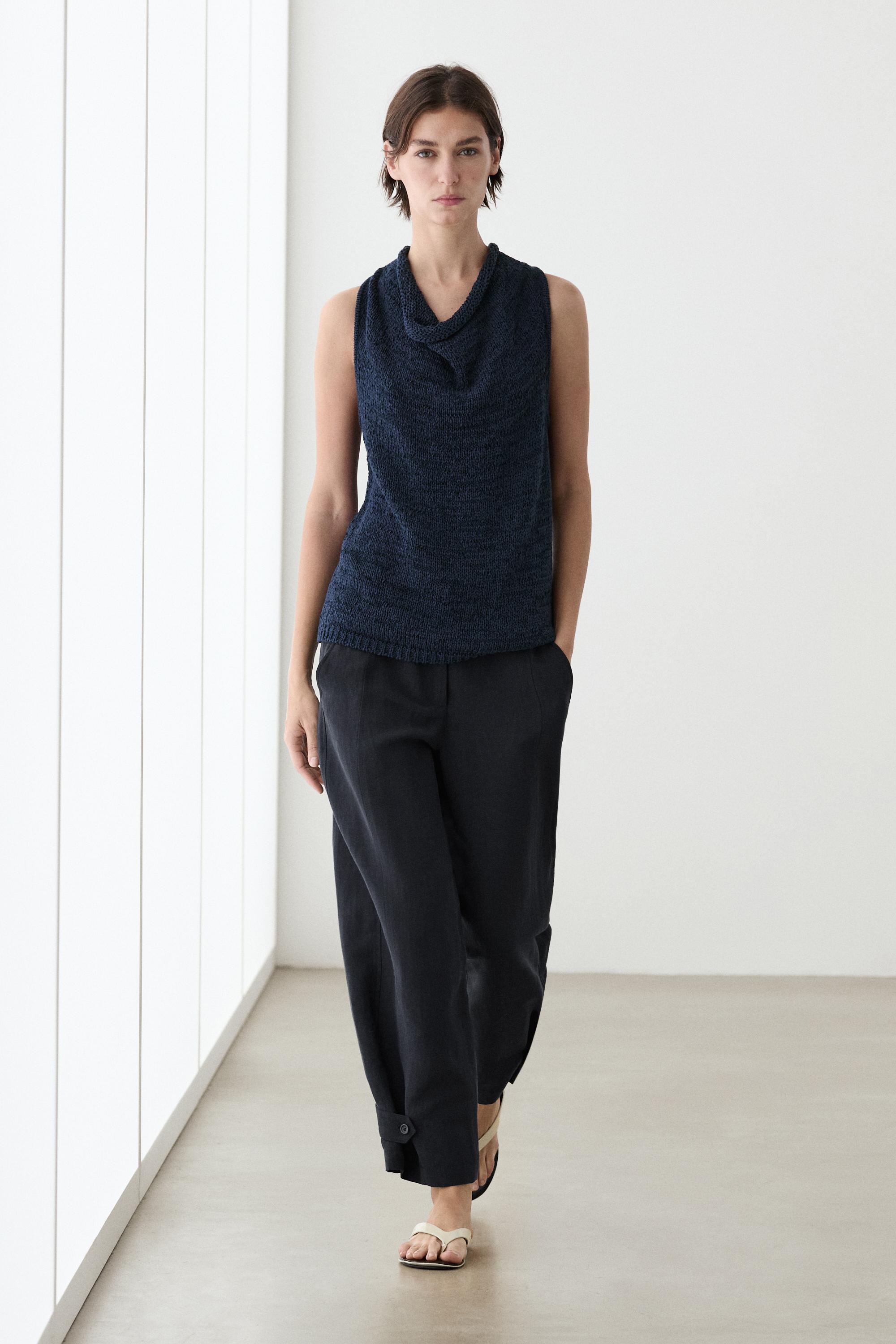 Flowing linen blend pants with buttoned tab detail